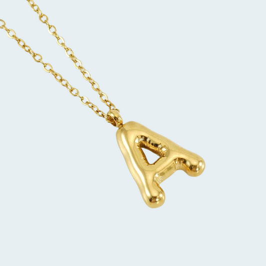 Collar inicial dorado globo